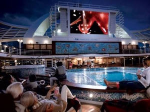 Watch a movie while winding down by the pool side 